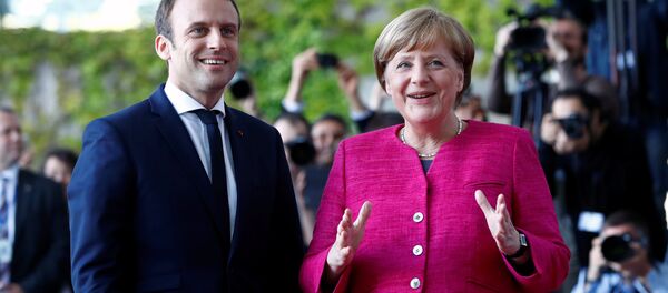 Emmanuel Macron et Angela Merkel Emmanuel Macron et Angela Merkel - Sputnik Afrique