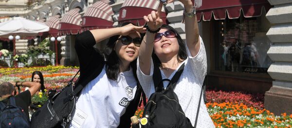 Фестиваль цветов в ГУМе Фестиваль цветов в ГУМе - Sputnik Afrique