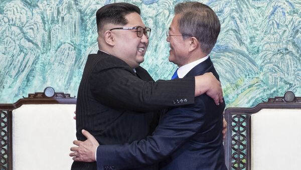 Kim Jong-un et Moon Jae-in - Sputnik Afrique
