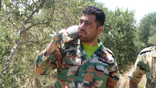 Des militaires syriens pilonnen les positions de djihadistes  - Sputnik Afrique