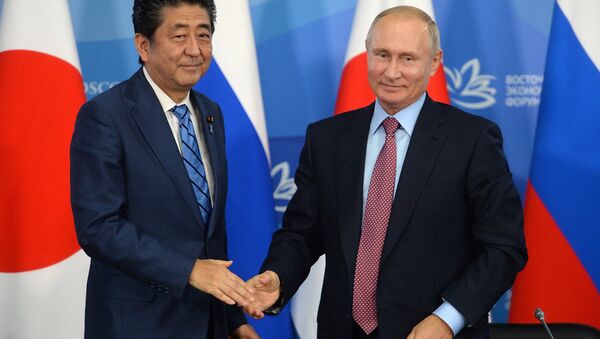 Vladimir Poutine et Shinzo Abe - Sputnik Afrique