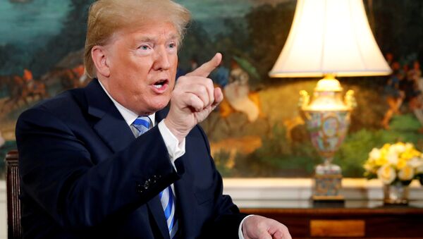US President Donald Trump speaks to reporters in the Diplomatic Room at the White House in Washington, DC - Sputnik Afrique