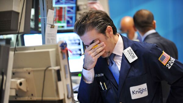 Jason Blatt of Knight Capital Americas, LP reacts to down market on the floor of the New York Stock Exchange August 8, 2011. - Sputnik Afrique