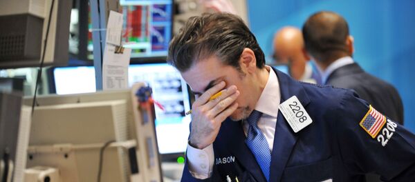 Jason Blatt of Knight Capital Americas, LP reacts to down market on the floor of the New York Stock Exchange August 8, 2011. - Sputnik Afrique