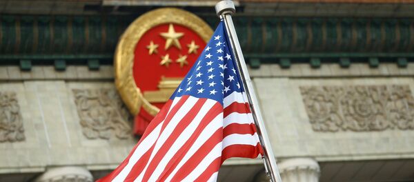 FILE PHOTO: A U.S. flag is seen during a welcoming ceremony in Beijing, China, November 9, 2017. REUTERS/Thomas Peter/File Photo - Sputnik Afrique