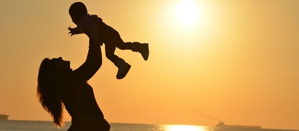 Une mère et son enfant Une mère et son enfant - Sputnik Afrique