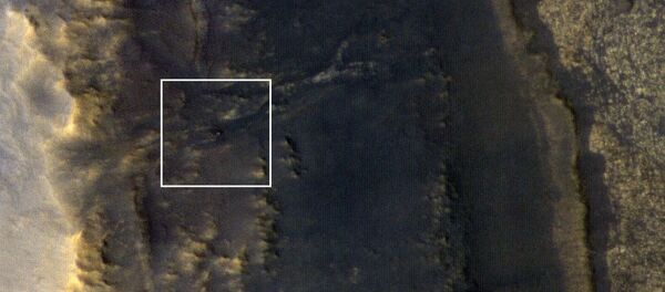 Le rover martien Opportunity pris en photo par la caméra HiRiSe installée sur la sonde MRO - Sputnik Afrique