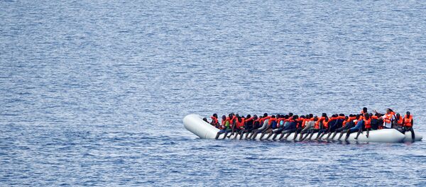 Des migrants Des migrants - Sputnik Afrique