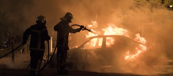 Un véhicule incendié (photo d'archive) - Sputnik Afrique