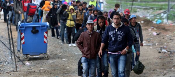 Des migrants - Sputnik Afrique