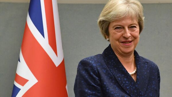 La Première ministre britannique Theresa May - Sputnik Afrique