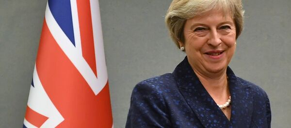 La Première ministre britannique Theresa May - Sputnik Afrique