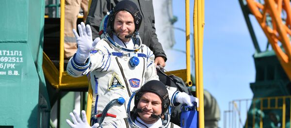 Члены экипажа МКС-57/58 перед отъездом на стартовую площадку космодрома «Байконур» - Sputnik Afrique