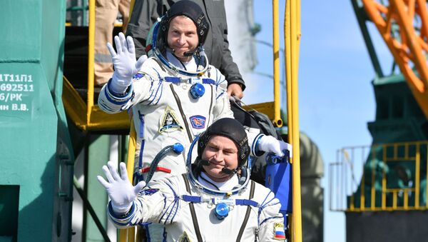Члены экипажа МКС-57/58 перед отъездом на стартовую площадку космодрома «Байконур» - Sputnik Afrique