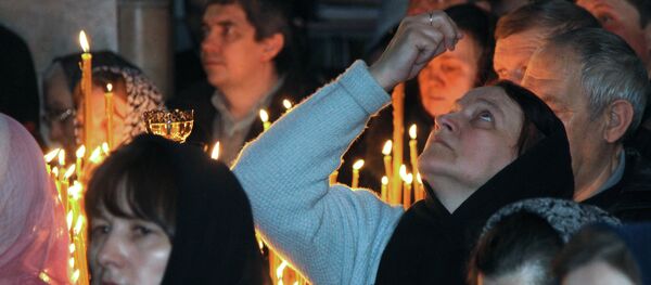 Un service religieux célébré dans la Laure des Grottes de Kiev - Sputnik Afrique