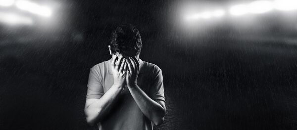 Un homme qui broie du noir - Sputnik Afrique