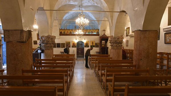 Церковь в христианском городе Мхарди на севере от города Хама, освобожденном сирийской армией от боевиков - Sputnik Afrique