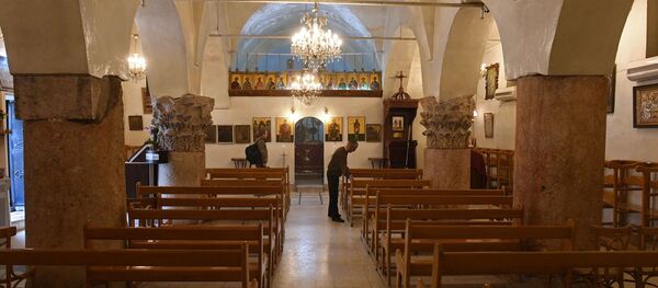 Церковь в христианском городе Мхарди на севере от города Хама, освобожденном сирийской армией от боевиков - Sputnik Afrique