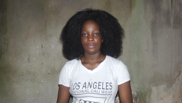 Prudence Kenembeni, à son retour à Yaoundé - Sputnik Afrique
