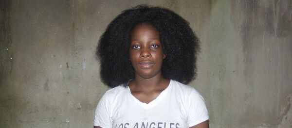 Prudence Kenembeni, à son retour à Yaoundé Prudence Kenembeni, à son retour à Yaoundé - Sputnik Afrique