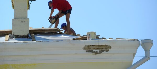 Sur un toit (image d'illustration) Sur un toit (image d'illustration) - Sputnik Afrique