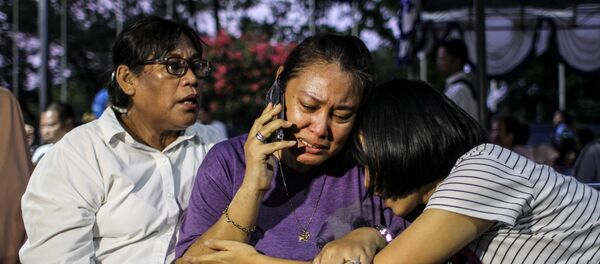 Proches des passagers de l'avion de Lion Air - Sputnik Afrique