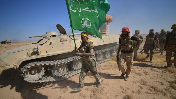 Une opération conjointe des combattants des Hachd al-Chaabi et les forces irakiennes (archive photo) - Sputnik Afrique