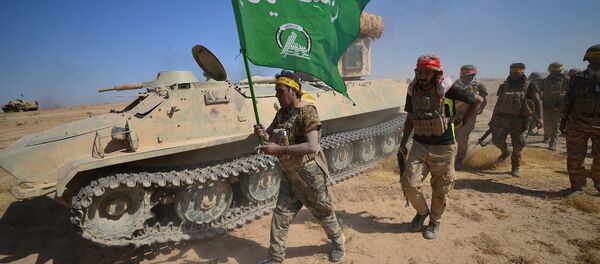 Une opération conjointe des combattants des Hachd al-Chaabi et les forces irakiennes (archive photo) - Sputnik Afrique