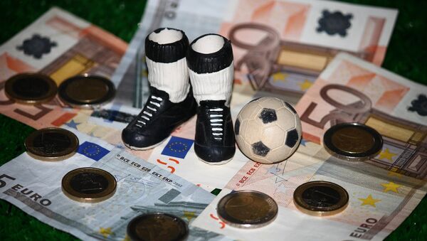 Le football et l'argent (image d'illustration) - Sputnik Afrique