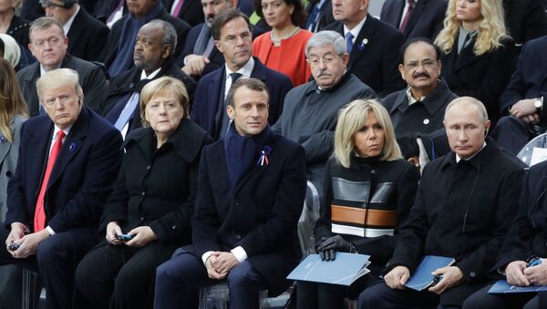 Donald Trump, Angela Merkel, Emmnuel Macron, Brigitte Macron y Vladímir Poutine - Sputnik Afrique