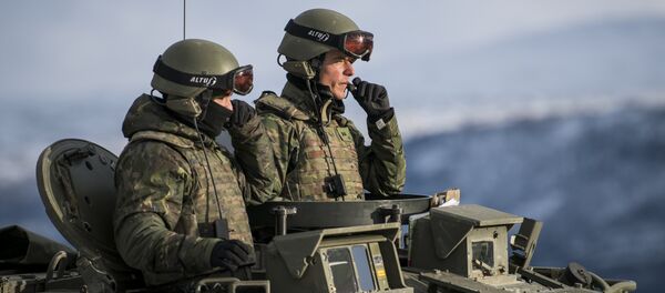 Spanish soldiers in an Pizarro tank during an exercise to capture an airfield as part of the Trident Juncture 2018, a NATO-led military exercise, on November 1, 2018 near the town of Oppdal, Norway. - Sputnik Afrique