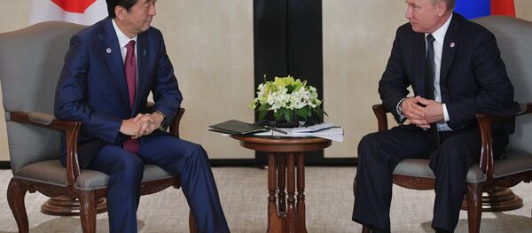 Shinzo Abe et Vladimir Poutine à Singapour - Sputnik Afrique