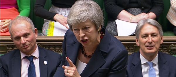 A still image from a video footage shows Britain's Prime Minister Theresa May speaking during Prime Minister's Questions in the House of Commons, in central London, Britain November 14, 2018 - Sputnik Afrique