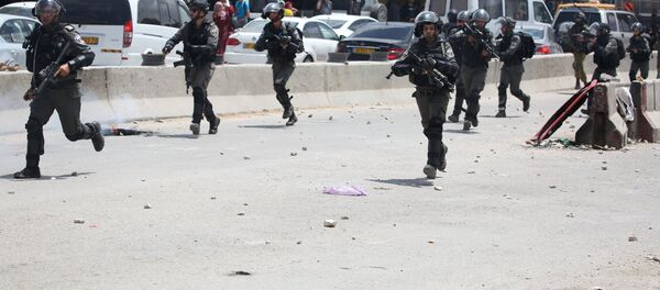 Des militaires israéliens lors des manifestations en Palestine - Sputnik Afrique