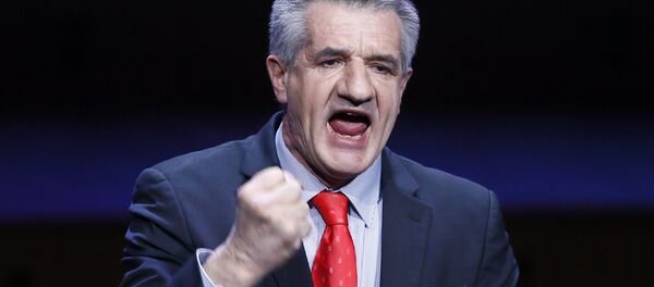 Independent candidate for the 2017 French Presidential election Jean Lassalle delivers his speech during the Gathering of French Mayors at Maison de la Radio in Paris, Wednesday, March 22, 2017. - Sputnik Afrique