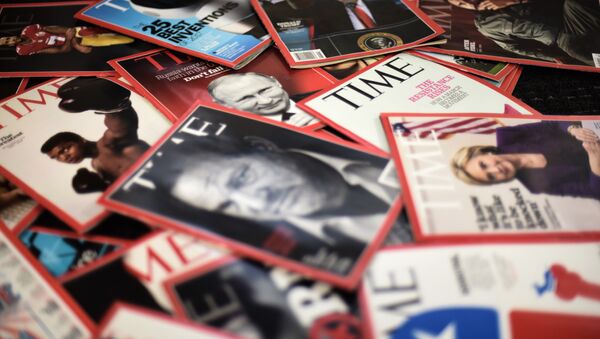 Time magazine copies are dispalyed on a table in Washgington on November 27, 2017. - Sputnik Afrique