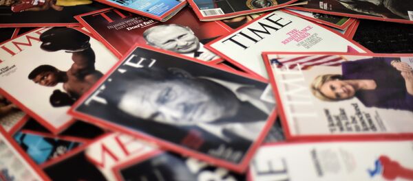 Time magazine copies are dispalyed on a table in Washgington on November 27, 2017. - Sputnik Afrique
