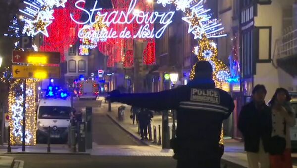 In this image made from video, emergency services arrive on the scene of a Christmas market in Strasbourg, France, Tuesday, Dec. 11, 2018 - Sputnik Afrique