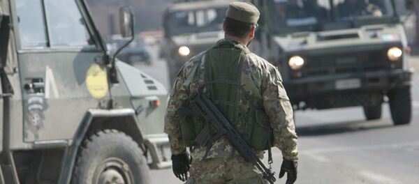 Un poste de contrôle à l'entrée de Pristina - Sputnik Afrique