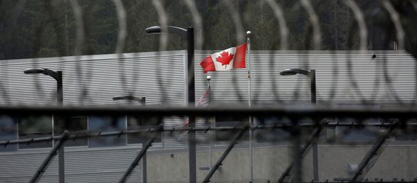 A Canadian flag flies outside of the Alouette Correctional Centre for Women, where Huawei CFO Meng Wanzhou is being held on an extradition warrant, in Maple Ridge, British Columbia, Canada December 8, 2018 - Sputnik Afrique