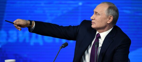 20 декабря 2018. Президент РФ Владимир Путин во время ежегодной большой пресс-конференции в Центре международной торговли на Красной Пресне. - Sputnik Afrique