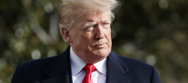 President Donald Trump walks to speak to the media before boarding Marine One on the South Lawn of the White House in Washington, Saturday, Dec. 8, 2018, for the short trip to Andrews Air Force Base en route to Philadelphia to attend the Army-Navy Football Game - Sputnik Afrique