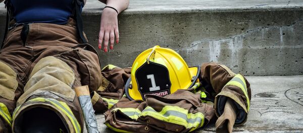 Une femme-pompier Une femme-pompier - Sputnik Afrique