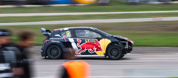 Sébastien Loeb au volant d'une Peugeot - Sputnik Afrique
