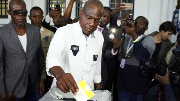 Businessman and candidate Martin Fayulu casting his own vote in DR Congo's presidential elections on December 30 - Sputnik Afrique
