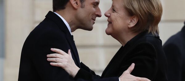 Emmanuel Macron et Angela Merkel - Sputnik Afrique