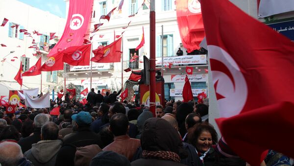 Les Tunisiens célèbrent les 8 ans de la Révolution - Sputnik Afrique