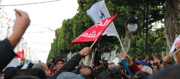 Les Tunisiens célèbrent les 8 ans de la Révolution - Sputnik Afrique
