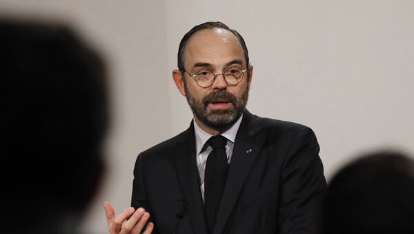 French Prime Minister Edouard Philippe delivers his speech during a press conference in Paris, Wednesday, Jan. 9, 2019. - Sputnik Afrique