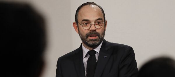 French Prime Minister Edouard Philippe delivers his speech during a press conference in Paris, Wednesday, Jan. 9, 2019. - Sputnik Afrique